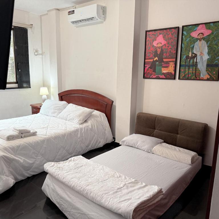 Casa con Habitaciones privadas - Habitación Familiar con baño privado - 14