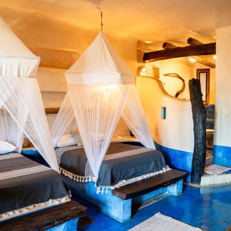 La Posada del Sol Boutique Hotel Tulum - Habitación con 2 camas dobles y vistas parciales al mar - 10