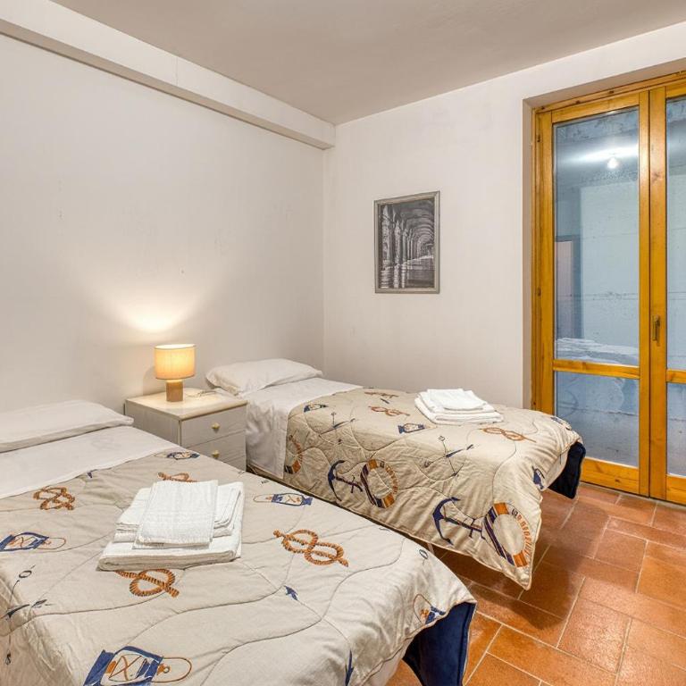 GuestHost - Il Glicine Flat x4 - Appartamento con 2 Camere da Letto - 4