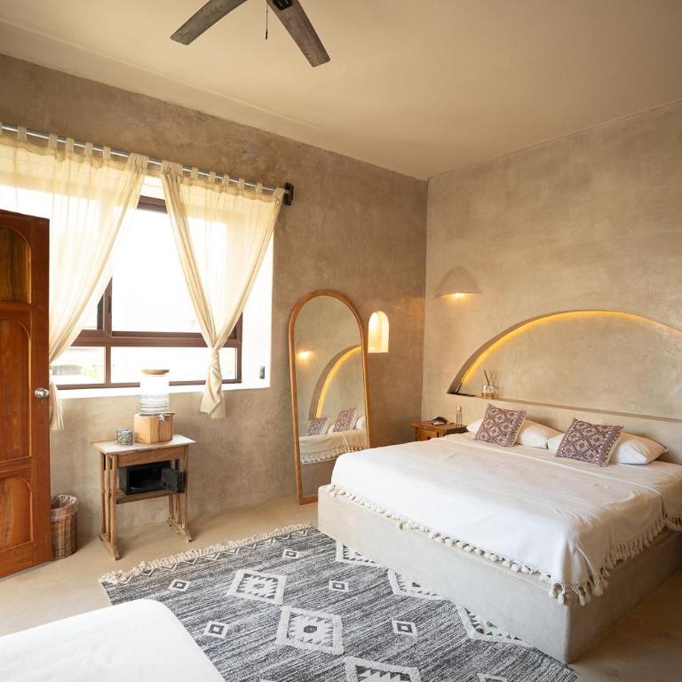 La Posada del Sol Boutique Hotel Tulum - Habitación con terraza o balcón y vistas al jardín - 11