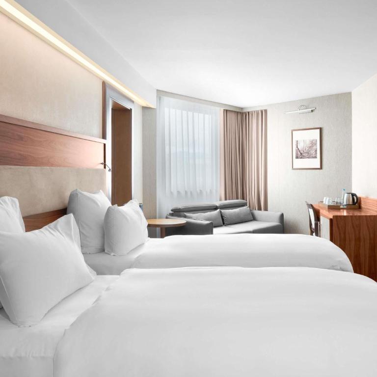 Movenpick hotel Sarajevo - Deluks Soba sa Bračnim Krevetom ili 2 Zasebna Kreveta i Kaučem - 3