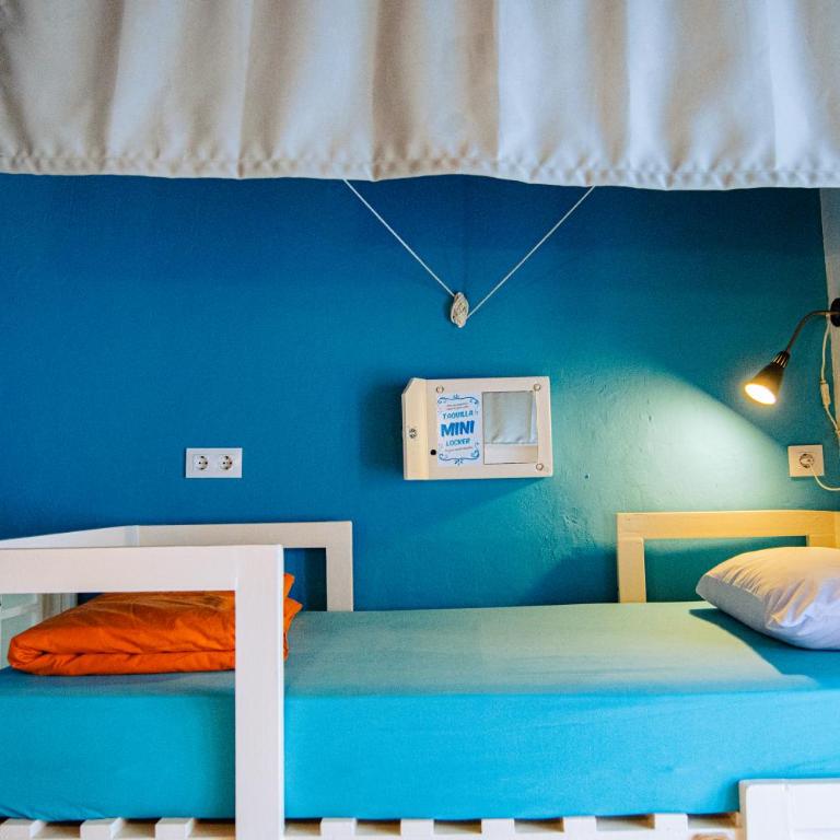 Casa Caracol - Cama en habitación compartida mixta con 7 camas y baño privado - 2