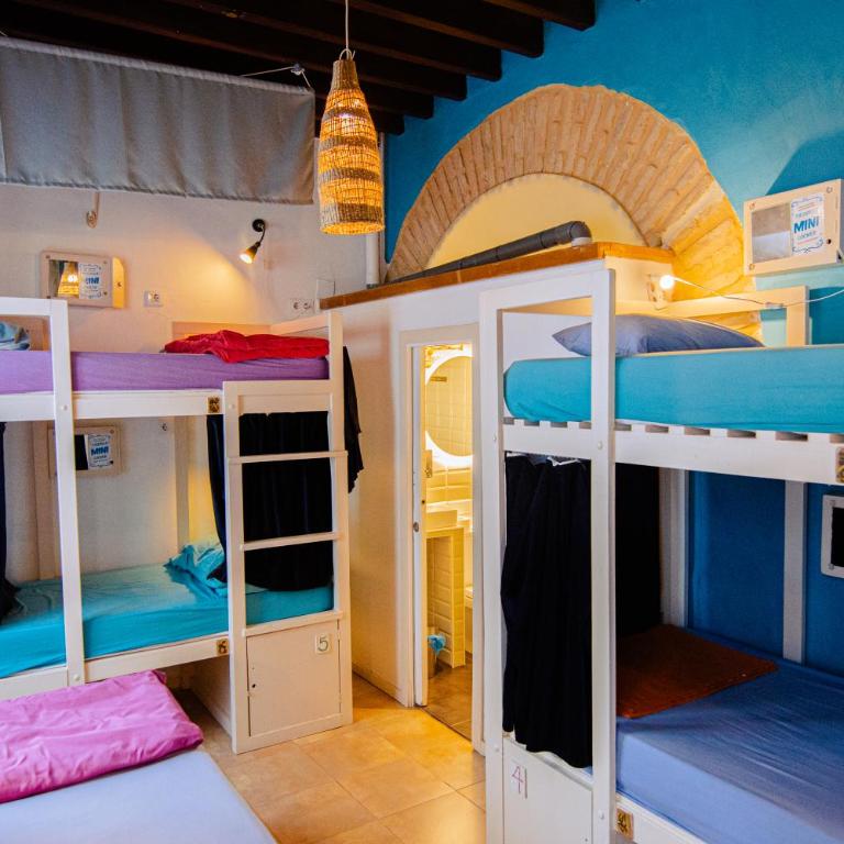 Casa Caracol - Cama en habitación compartida mixta con 7 camas y baño privado - 3