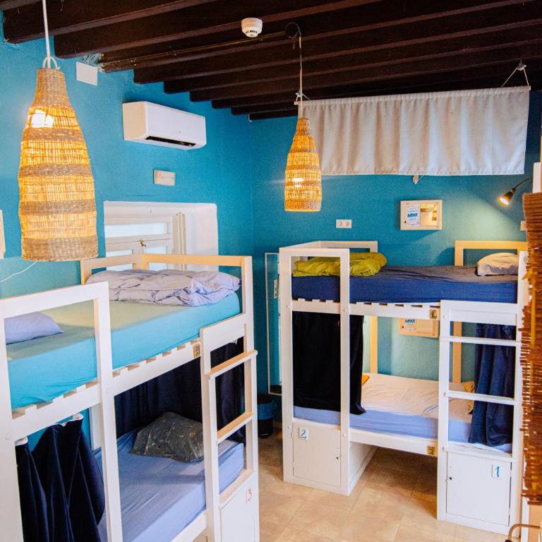 Casa Caracol - Cama en habitación compartida mixta con 7 camas y baño privado - 4