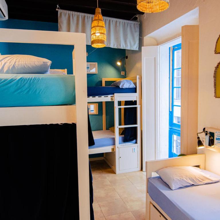 Casa Caracol - Cama en habitación compartida mixta con 7 camas y baño privado - 6