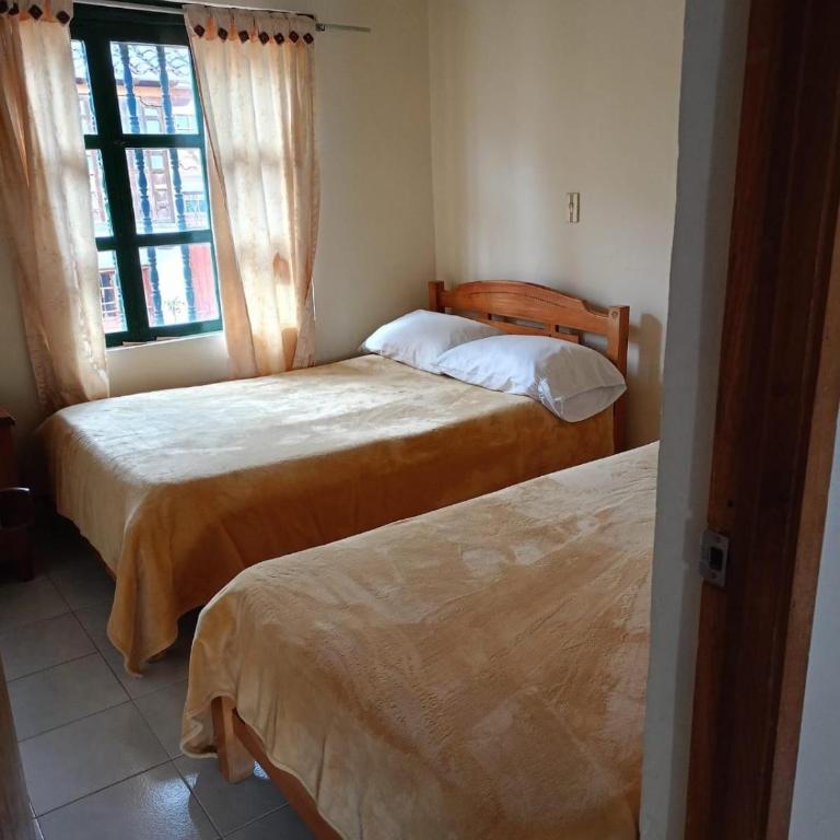 Abi Happy - Habitación Triple Básica con baño compartido - 4