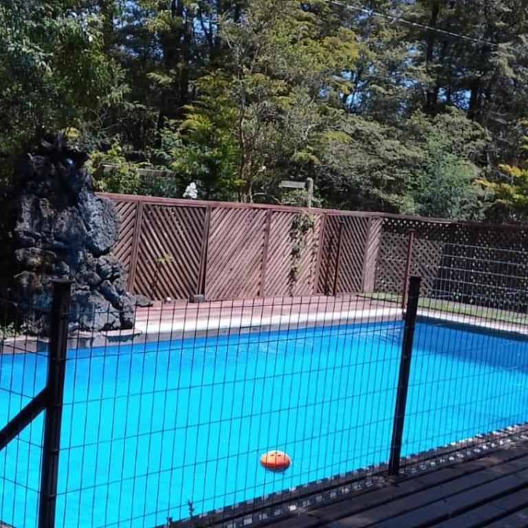 CASA CON TINAJA, PISCINA Y QUINCHO - Pucón - Three-Bedroom Vacation Home - 33