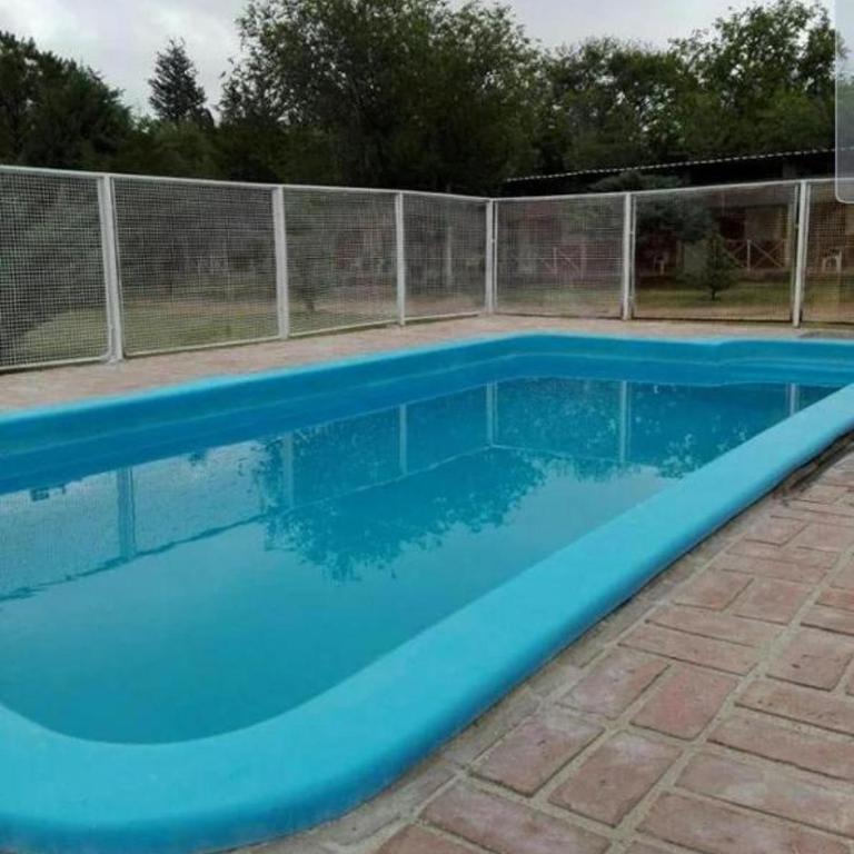 Departamento Los Nidos Villa Cura Brochero - Apartamento de 2 dormitorios con vistas al jardín - 7