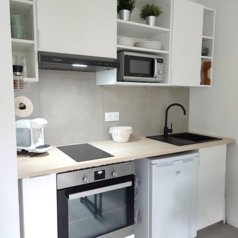 Studio Cosy, résidence sécurisée, parking privé - Appartement 1 Chambre - 13