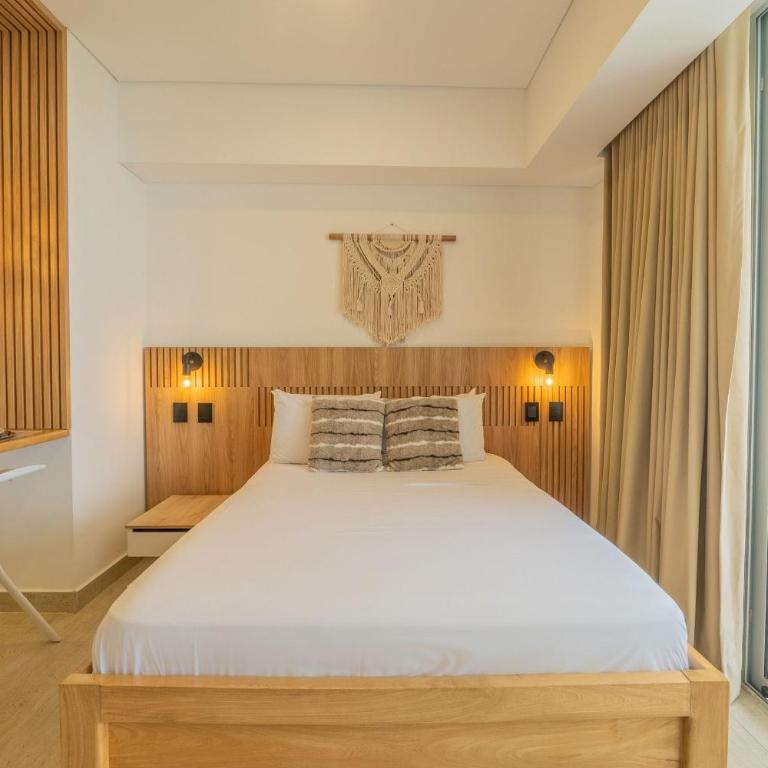 CB1006 Nueva Suite Frente al Mar - 2min Aeropuerto - Suite con cama grande - 2