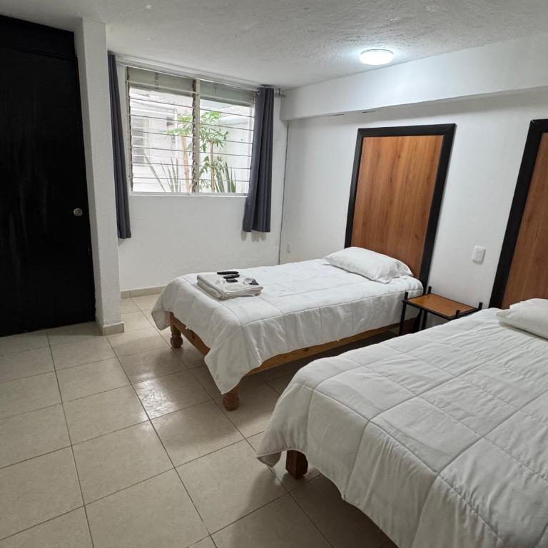 Departamentos H72 - Habitación Doble Económica - 2 camas - 5