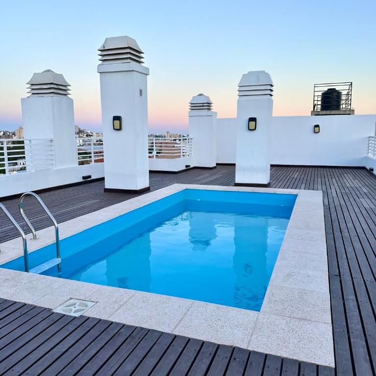 Urban Alberdi Dpto con cochera, pileta y seguridad 24 hs - Apartamento de 1 dormitorio - 17