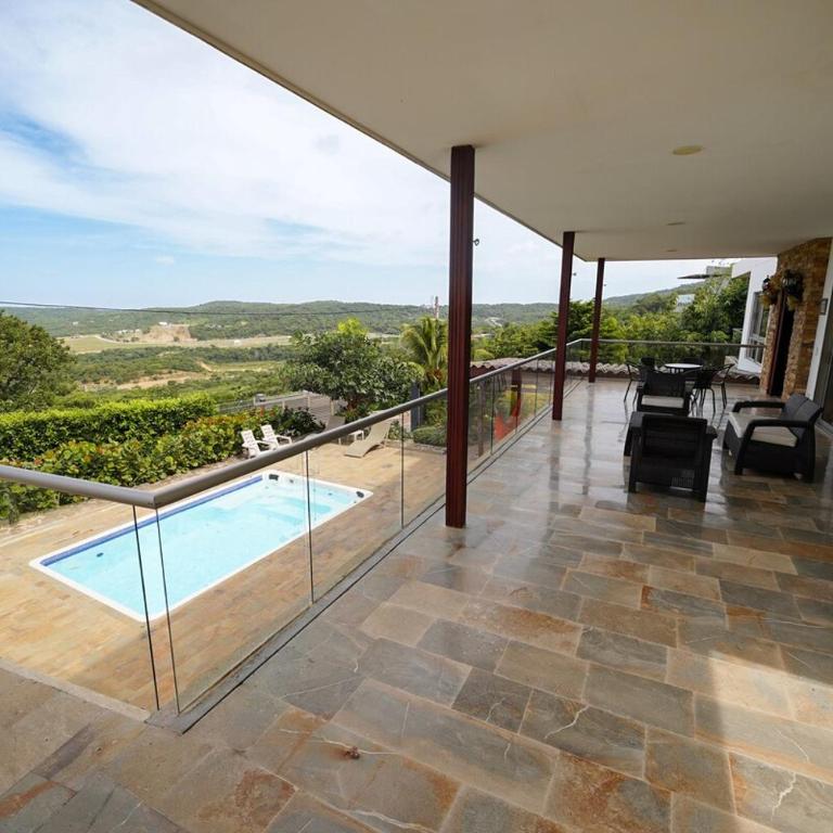 Casa Juliana vista al mar piscina y jacuzzi - Three-Bedroom House - 13
