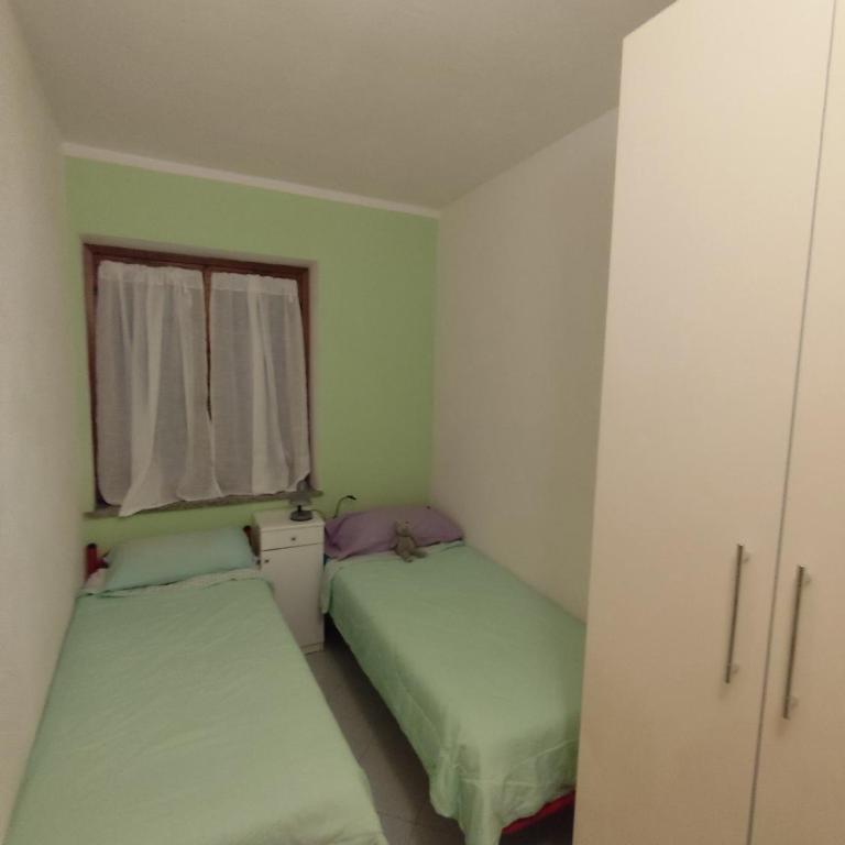 Anna, trilocale a Budoni con splendida vista mare - Casa con 2 Camere da Letto - 13