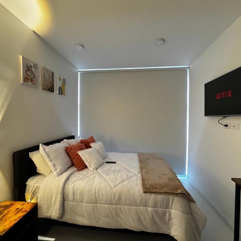 Moderno Studio con Rooftop y Vista a la Ciudad Zona 93 - Apartamento de 1 dormitorio - 7