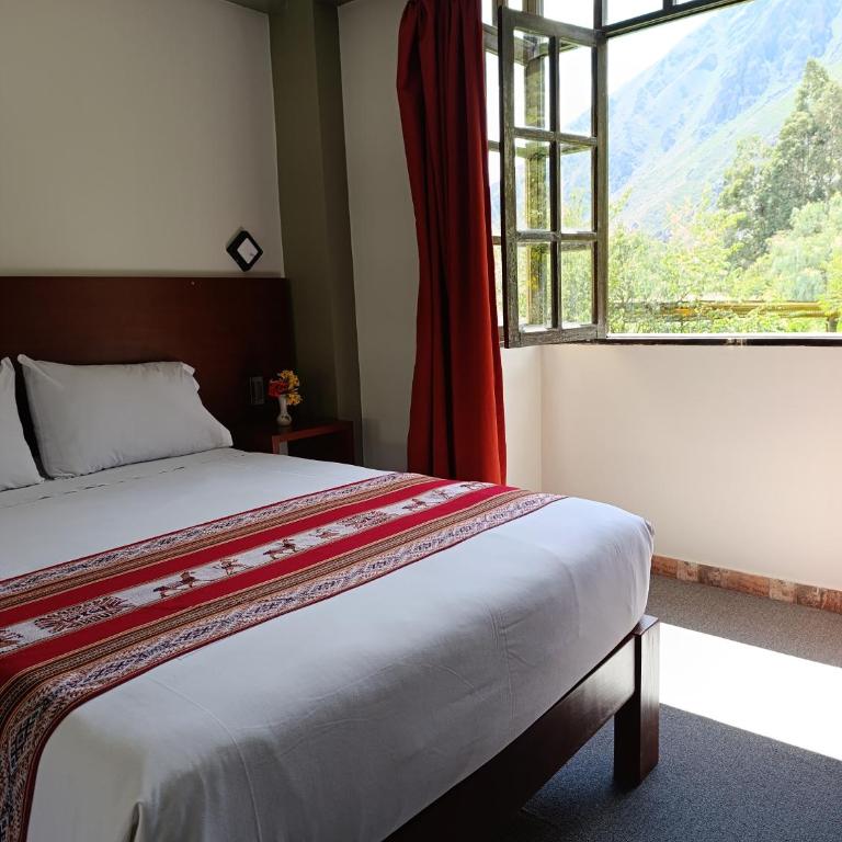 Samana House Ollantaytambo - Habitación con cama grande y vistas al jardín - 19