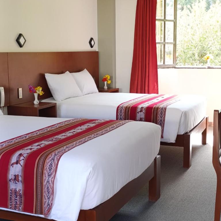 Samana House Ollantaytambo - Habitación con cama grande y vistas al jardín - 27