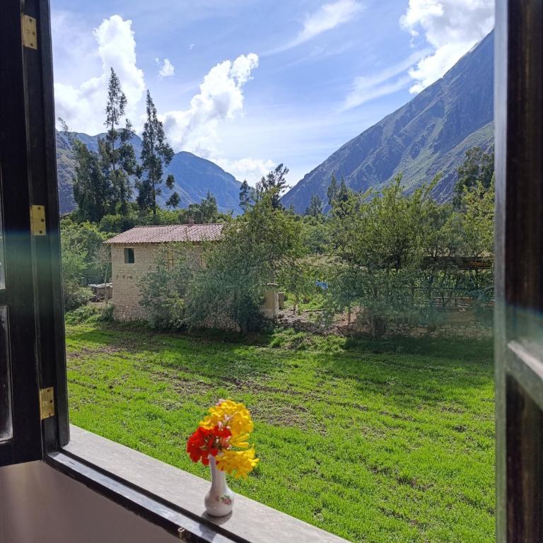 Samana House Ollantaytambo - Habitación con cama grande y vistas al jardín - 37