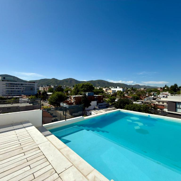 Departamento moderno pleno centro con pileta y cochera privada - Apartamento de 1 dormitorio - 31