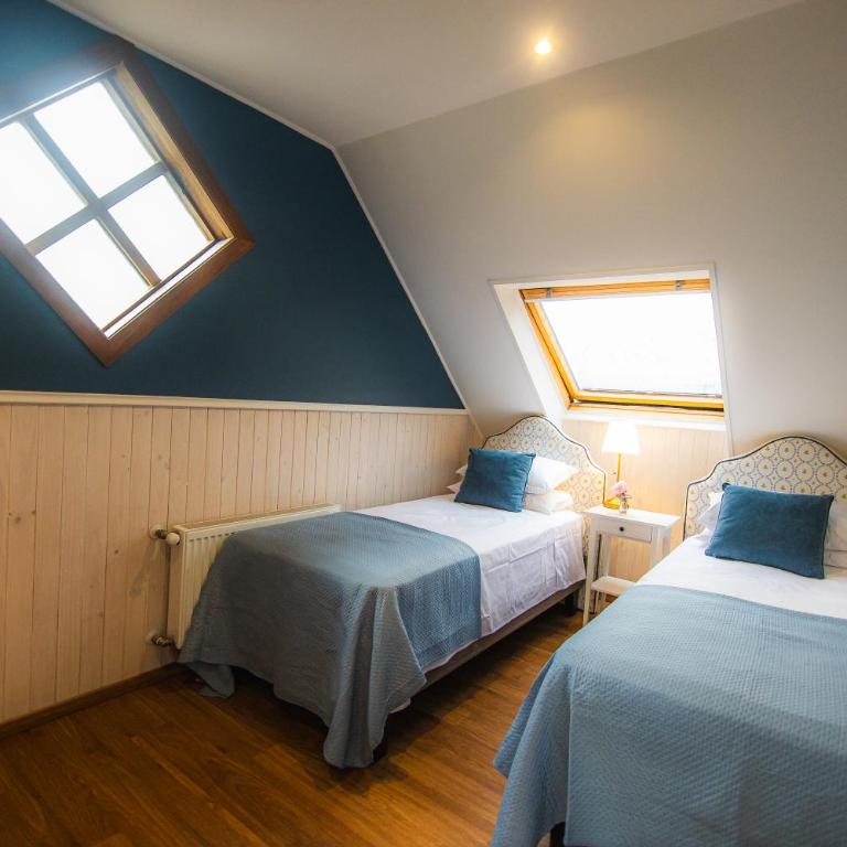 Casa Ecke-Frutillar bajo a una cuadra de la playa - Family Suite with Balcony - 16