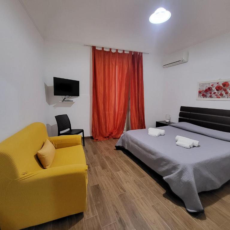 Appartamenti Flavica - Ampia Camera Matrimoniale/Doppia con Letti Singoli - 1