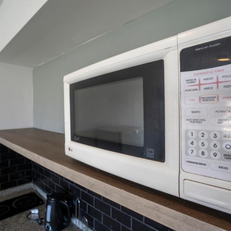 Complejo Quartier Puerto Urbano - Estudio Deluxe con cama grande - 28