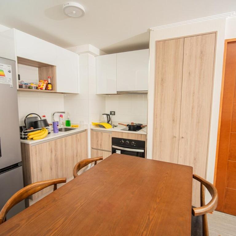 Departamento Distrito 1 Cavancha Piso 19 - Two-Bedroom Apartment - 17