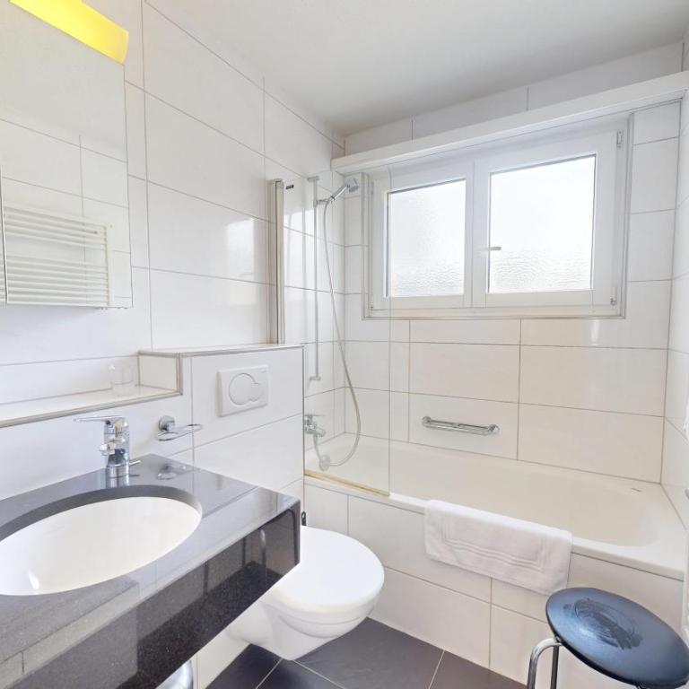 Großzügige 4 Schlafzimmer Wohnung in Davos Bergblick zentrale Lage - Apartment mit 4 Schlafzimmern - 12