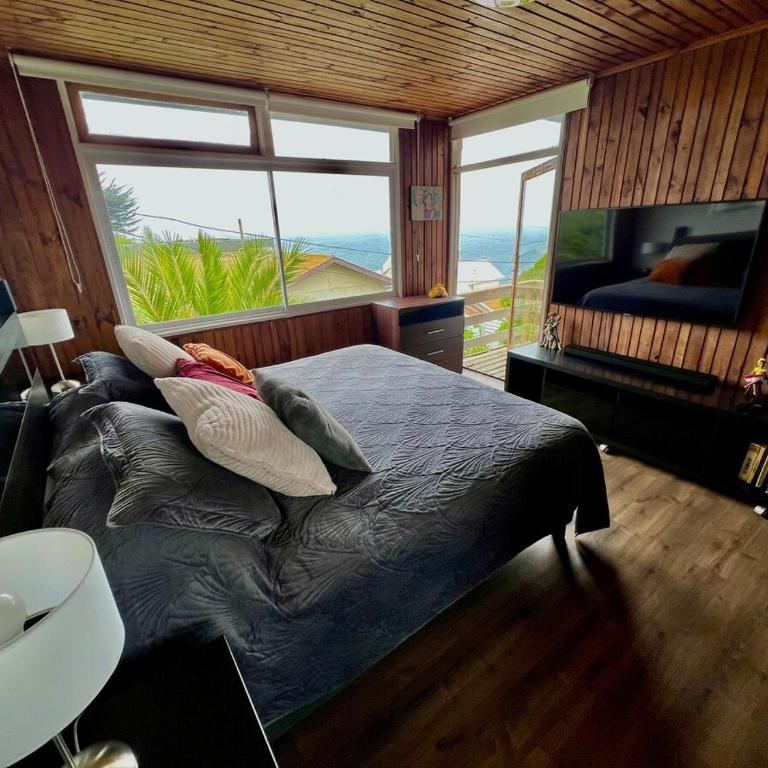 Acogedora casa con hermosa vista en sector muy tranquilo - Four-Bedroom Deluxe Home - Oceanfront - 35
