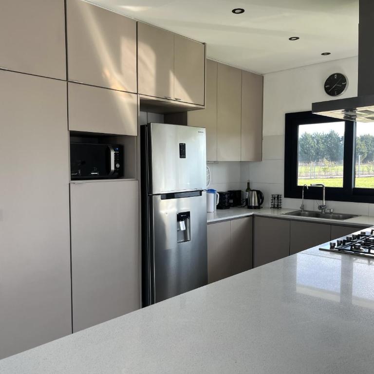 Casa Romi - Casa para 6 PAX con pileta en Arenas Chico, Mar del Plata - Hola Sur - Casa de 3 dormitorios - 5