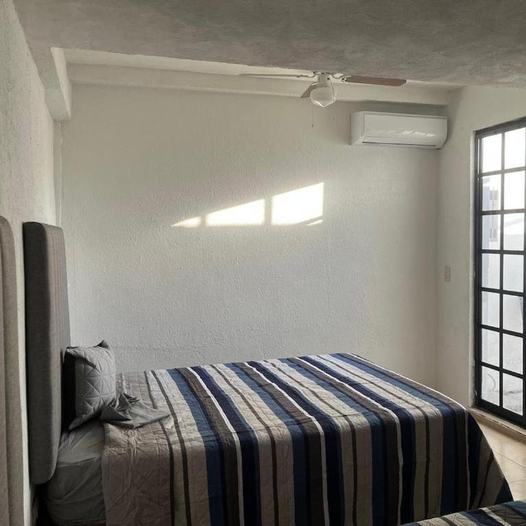 Cozy and family-friendly house CARE and UANL - Two-Bedroom Apartment - 6