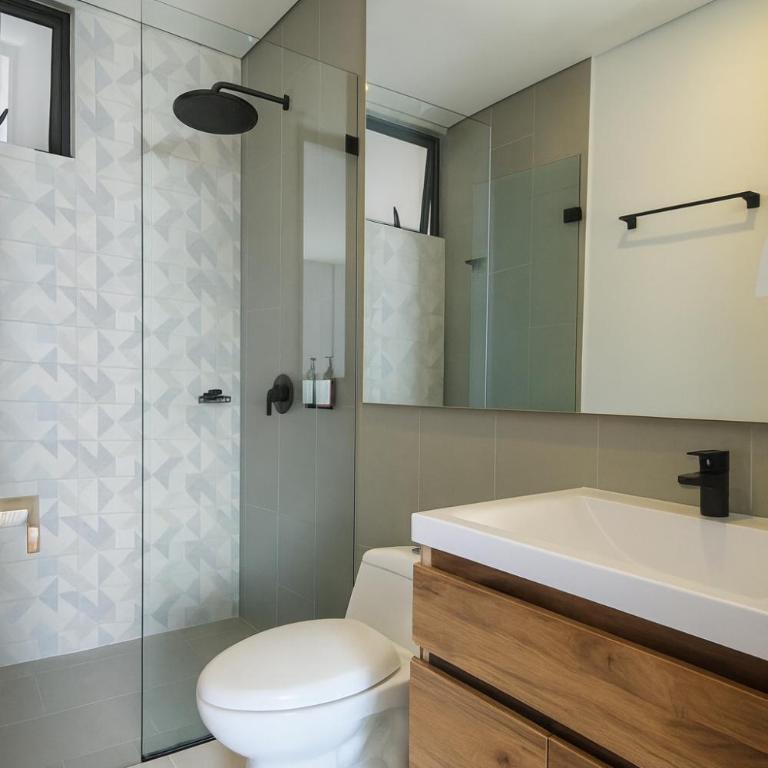 Apartamento con suite y encanto costero - Three-Bedroom Apartment - 13