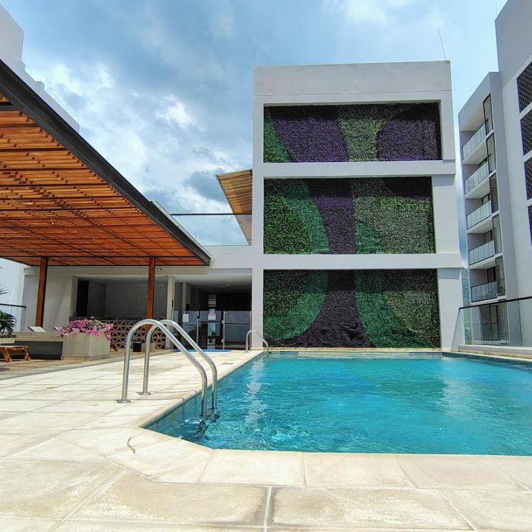 Apartamento con suite y encanto costero - Three-Bedroom Apartment - 33