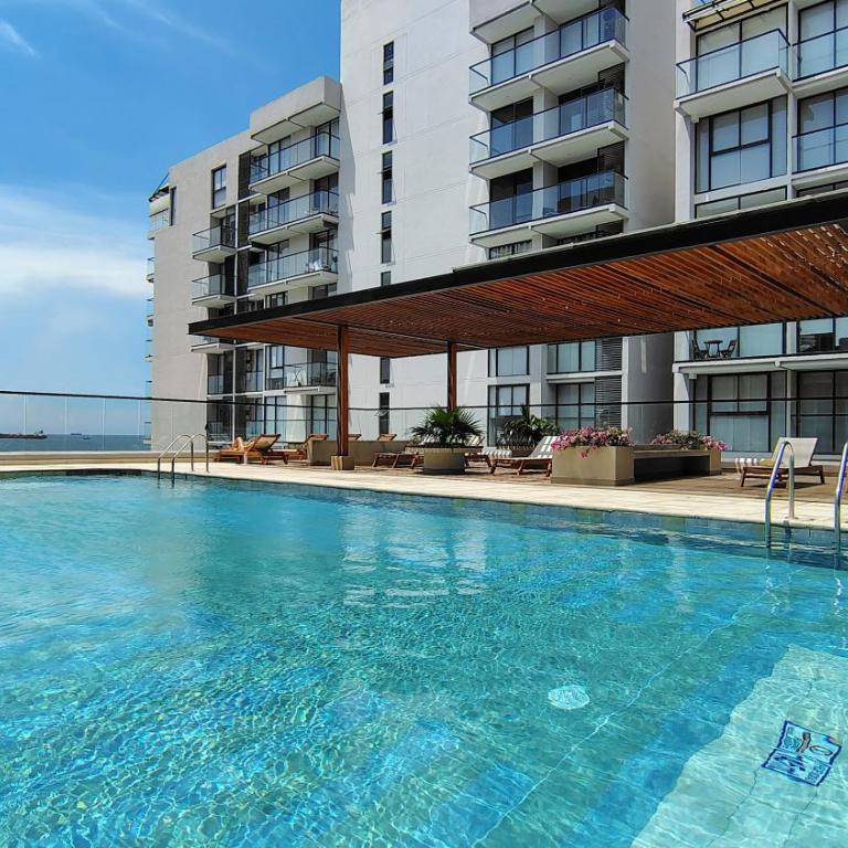 Apartamento con suite y encanto costero - Three-Bedroom Apartment - 32