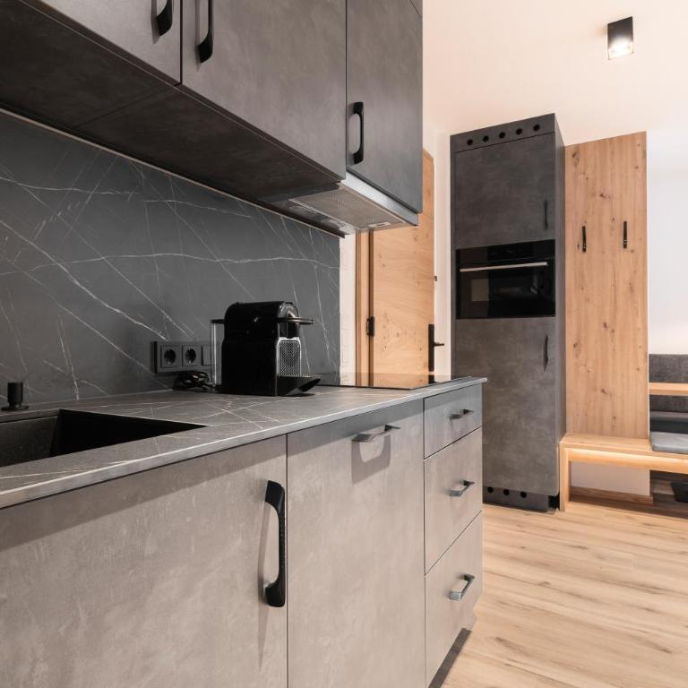Almfried Apartments - Apartment mit 1 Schlafzimmer und Balkon - 12