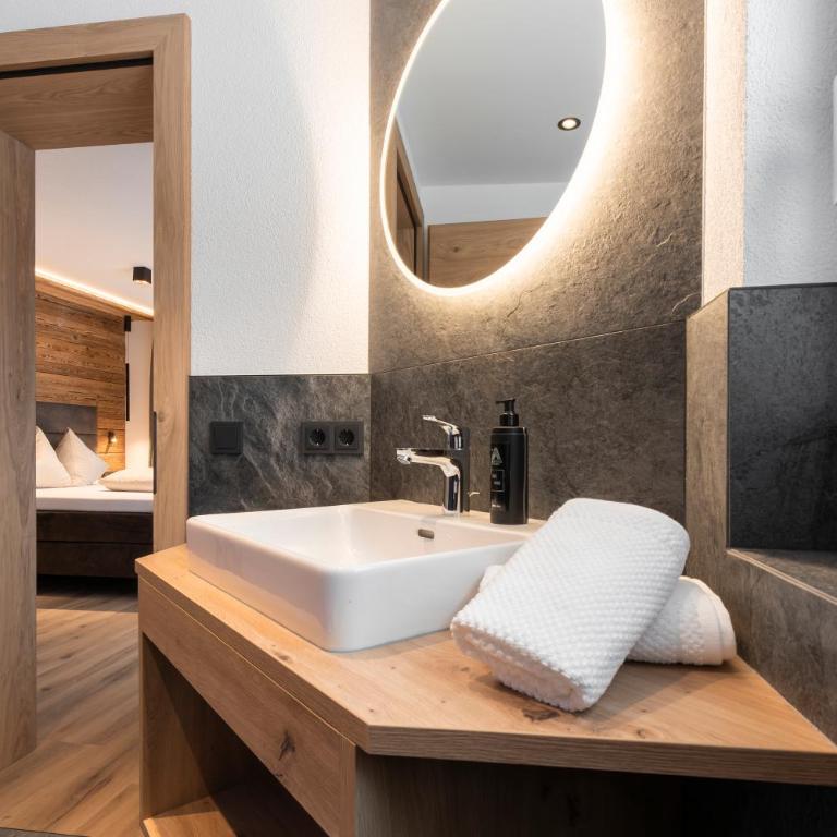 Almfried Apartments - Apartment mit 1 Schlafzimmer und Balkon - 21