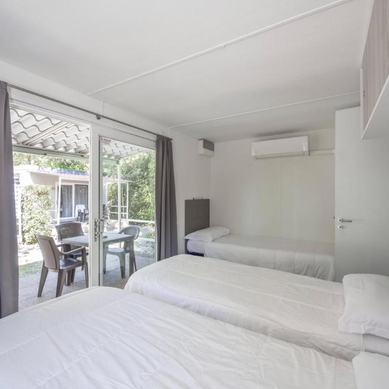 Camping Village Torre Pendente - Camera Tripla Premium - 12
