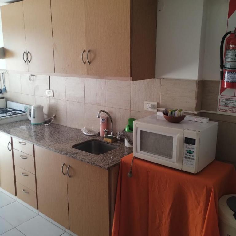 Departamento céntrico con cochera - Apartamento de 2 dormitorios - 11