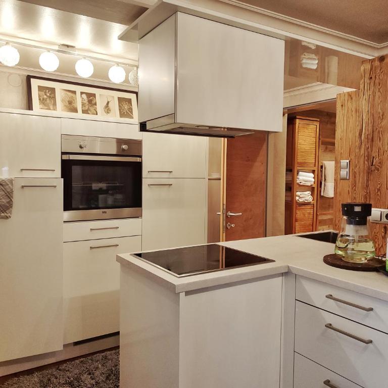 KOSIS Townhouse mit Spa Zugang im KOSIS Sports Lifestyle Hotel und Gartennutzung - Apartment - Souterrain - 3