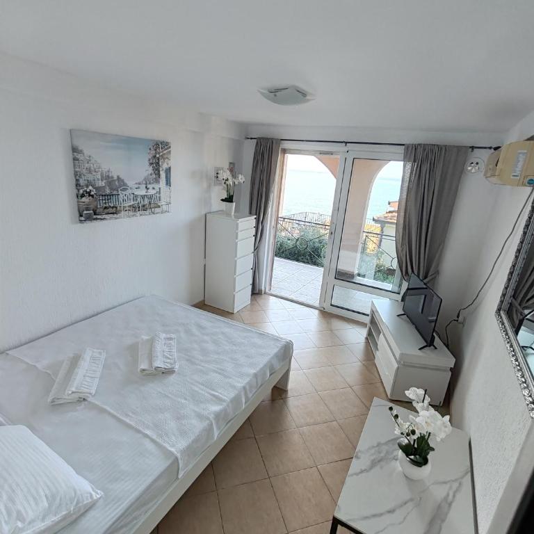 Villa Contact - One-Bedroom Apartment with Sea View and Terrace - 24