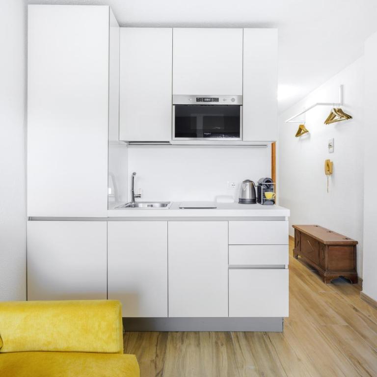 Hostdomus - Yellow Suite - Monolocale Familiare - 9