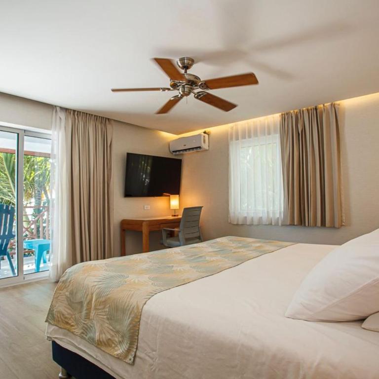 Hotel Cocoplum Beach - Habitación con cama extragrande y vistas al mar - 3