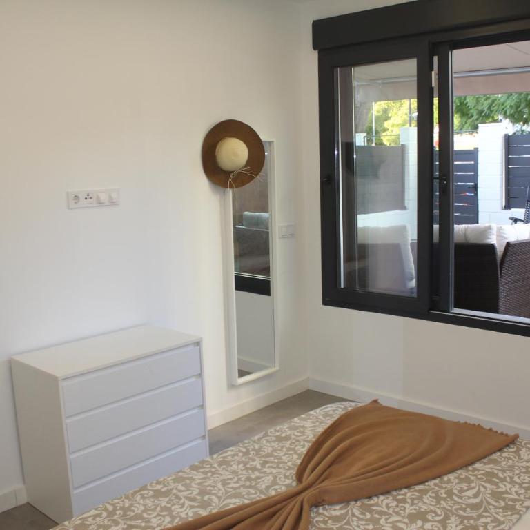 Casa con piscina y terraza junto Hotel Bali - Apartamento - 23