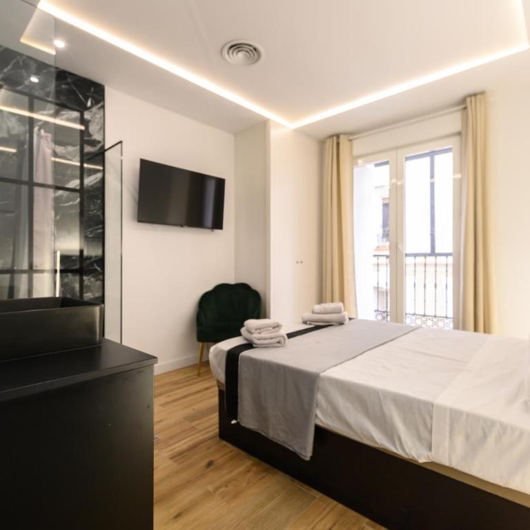 Amplio piso exterior de 2 dormitorios en Centro de Madrid Temporal SCSD14 - Two-Bedroom Apartment - 24