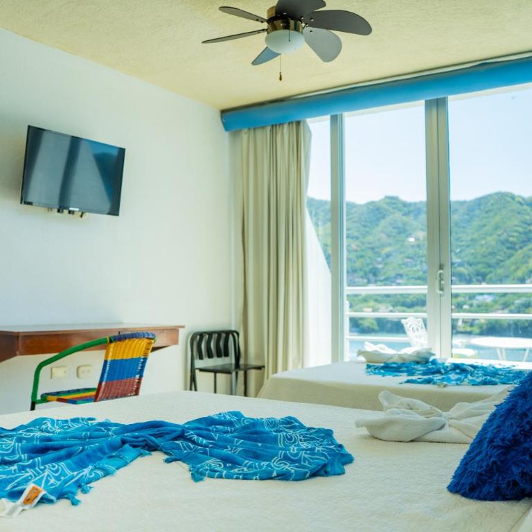 Hotel Bahia Taganga - Habitación Doble Deluxe con balcón y vistas al mar - 3