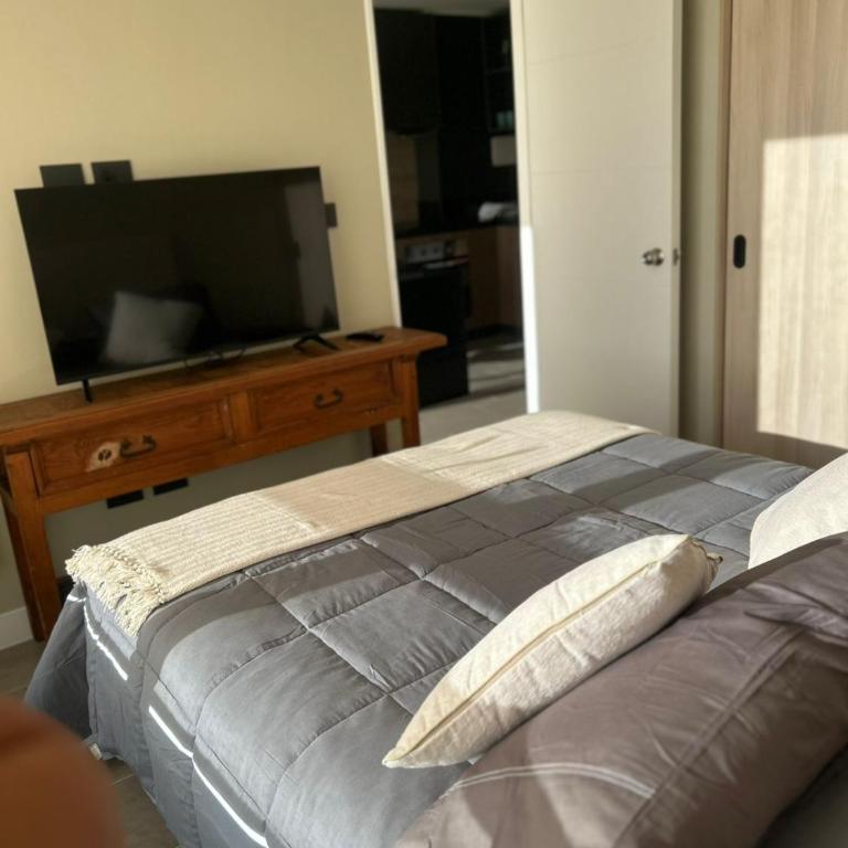 Departamento Nuevo 1D1B con estacionamiento sobre stripcenter y supermercado - Apartamento de 1 dormitorio con terraza - 5