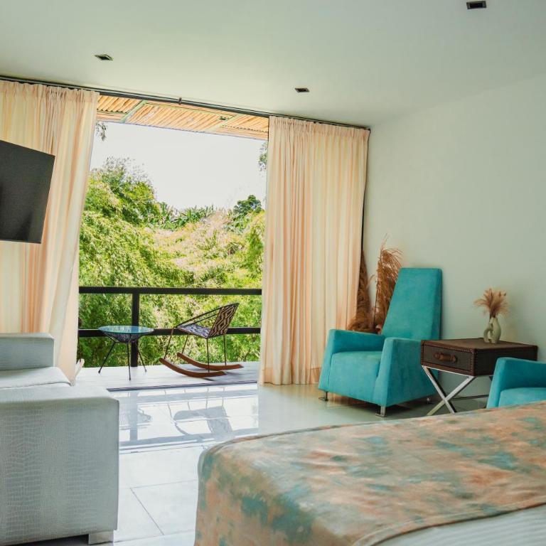 Hotel Terra Tacuara - Suite con cama grande y balcón - 3