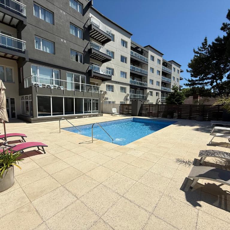 Departamento con Pileta Climatizada y Cochera en Pinamar - One-Bedroom Apartment - 13