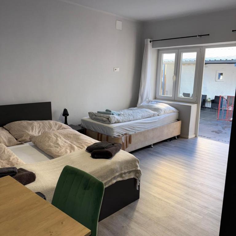 GRAZis Apartments - Doppelzimmer mit Zustellbett - 6