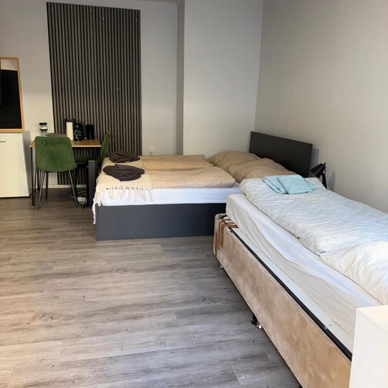 GRAZis Apartments - Doppelzimmer mit Zustellbett - 1
